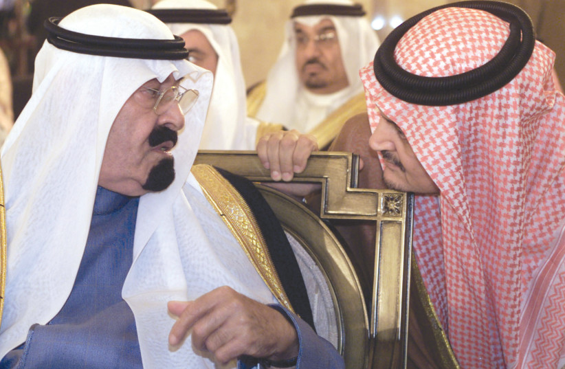  THEN-SAUDI CROWN PRINCE Abdullah (left) chats with his foreign minister, Prince Saud al-Faisal at the end session of an Arab summit held in Beirut, in 2002. The summit unanimously endorsed a Saudi-inspired plan for Middle East peace. (credit: MOHAMED AZAKIR/REUTERS)