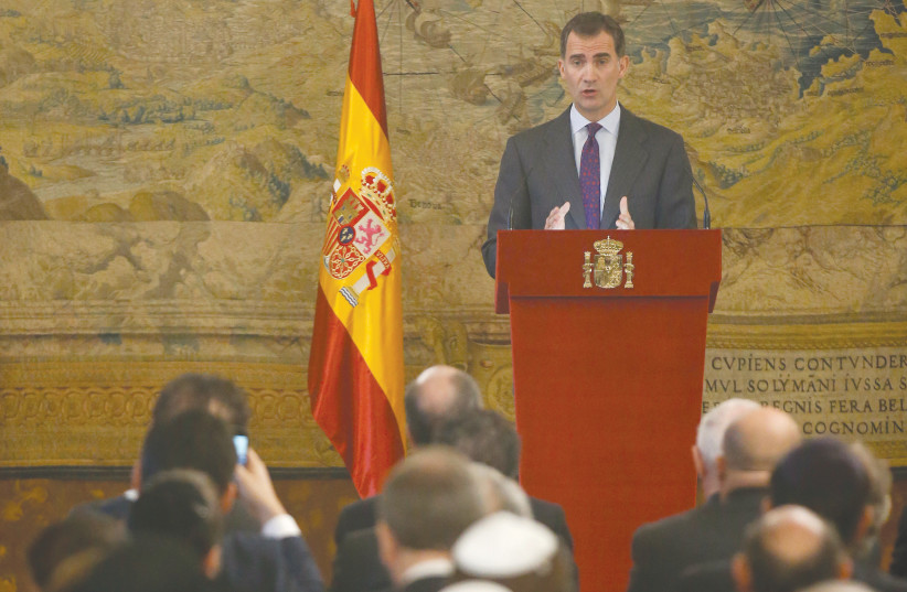  KING FELIPE OF SPAIN speaks at a ceremony at the royal palace in Madrid in 2015 celebrating a law that allowed people who can prove they are descendants of Jews expelled from Spain in 1492 and maintained ties with the country to apply for Spanish citizenship.  (photo credit: ANDREA COMAS/REUTERS)