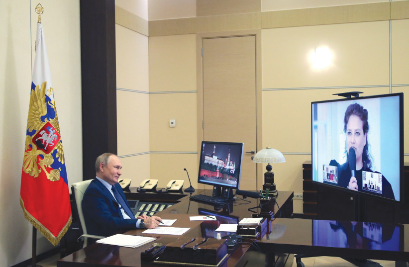  RUSSIAN PRESIDENT Vladimir Putin holds a video meeting last week with officials and cultural workers, including recipients of prizes for cultural achievements. Surrounded by yes-men, Putin appears to be suffering from hubris syndrome.  (photo credit: Sputnik/Kremlin/Reuters)