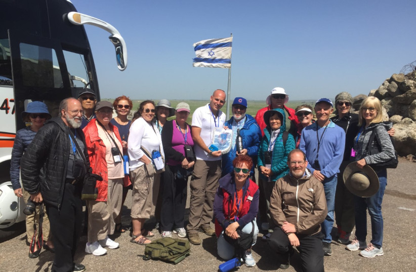  Yossi Yeinan with a group he is guiding. (photo credit: COURTESY YOSSI YEINAN)