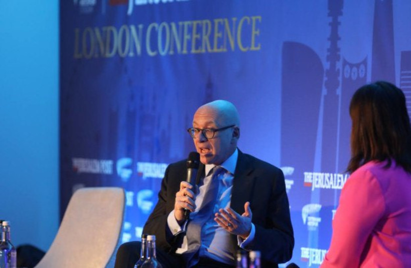 Lord David Wolfson speaks with the Jerusalem Post's Lahav Harkov at the Jerusalem Post London Conference. (credit: MARC ISRAEL SELLEM)