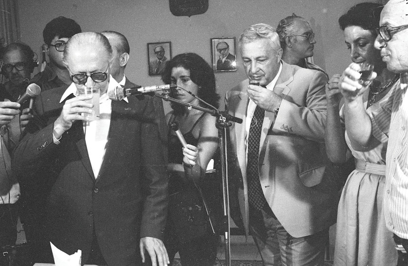  TOASTING ARIEL SHARON’S appointment as defense minister, 1981.  (credit: Dan Hadani/National Library of Israel)