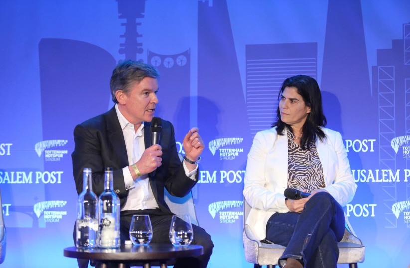 Sir Hugh Robertson, Chairman of the British Olympic Association and Yael Arad, President of the Olympic Committee of Israel at the Jerusalem Post London Conference, March 31, 2022.  (credit: MARC ISRAEL SELLEM/THE JERUSALEM POST)