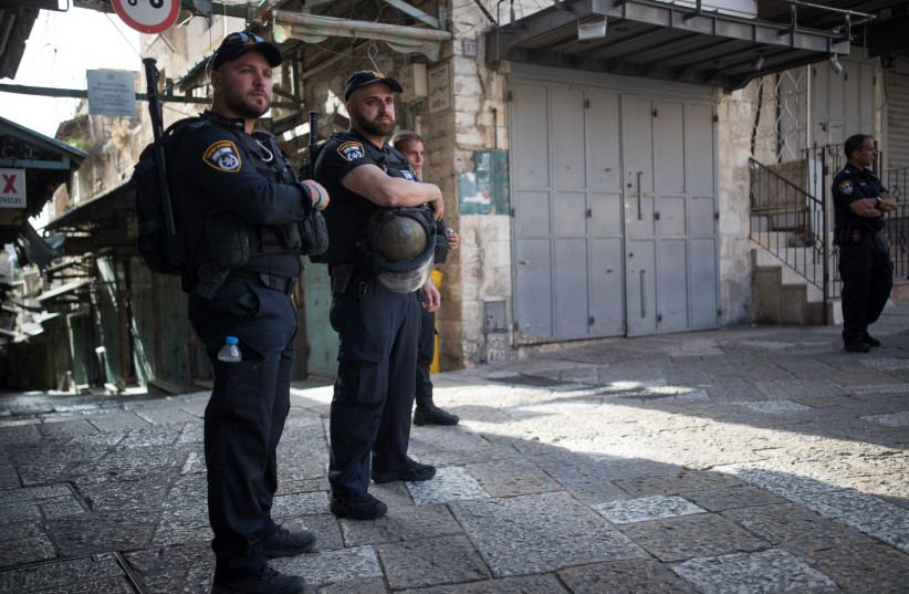 Israeli security forces at the scene of a stabbing attack in the Old City of Jerusalem, on May 31, 2019. (photo credit: YONATAN SINDEL/FLASH90)