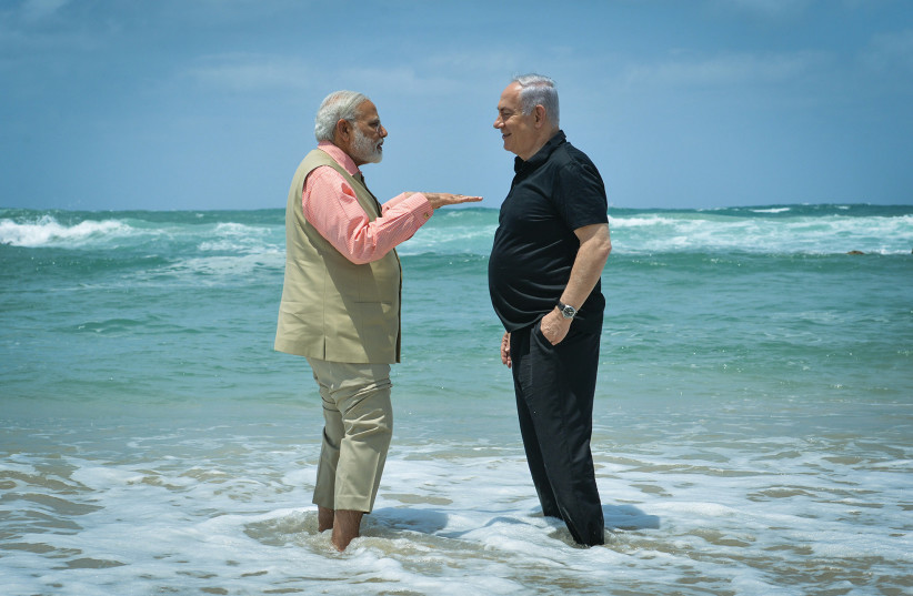 PRIME MINISTER Benjamin Netanyahu and visiting Indian Prime Minister Narendra Modi visit the water desalination plant at Olga beach, in 2017. (photo credit: KOBI GIDEON/GPO)