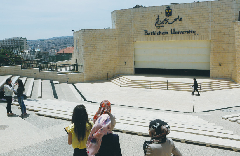  STUDENTS SEEN on the Bethlehem University campus. That students would openly support a radical terror group spells trouble for Abbas and the Palestinian Authority. (photo credit: MIRIAM ALSTER/FLASH90)
