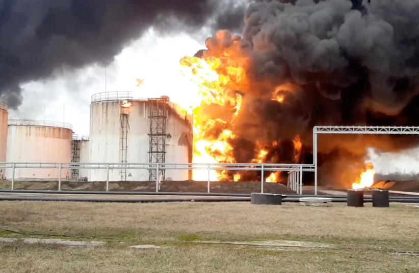  A still image taken from video footage shows a fuel depot on fire in the city of Belgorod, Russia April 1, 2022. (photo credit: Russian Emergencies Ministry/Handout via REUTERS)