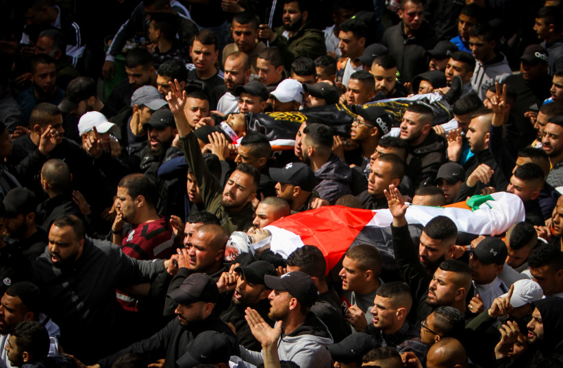  Palestinians take part in the funeral of two Palestinians who were shot dead by Israeli security forces during clashes, during their funeral in Jenin, in the West Bank, March 31, 2022. (credit: NASSER ISHTAYEH/FLASH90)