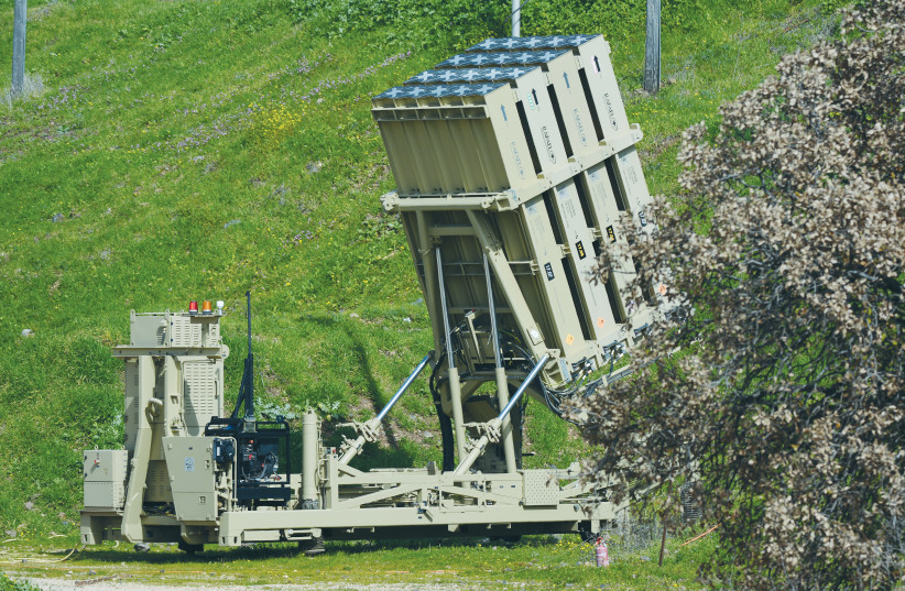  AN IRON DOME anti-missile system is positioned near the Israeli border with Lebanon. (photo credit: MICHAEL GILADI/FLASH90)