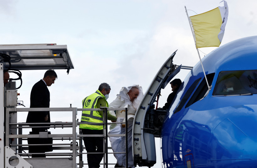  Pope Francis arrives to board a plane for his visit to Malta, at Leonardo da Vinci-Fiumicino Airport in Rome, Italy, April 2, 2022. (photo credit: Yara Nardi/Reuters)