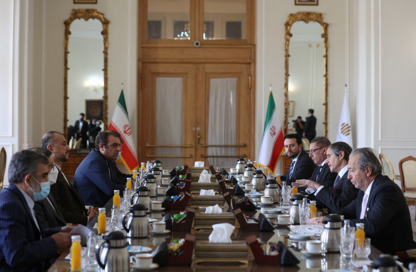 International Atomic Energy Agency (IAEA) Director General Rafael Mariano Grossi meets with Iran's Foreign Minister Hossein Amir-Abdollahian in Tehran, Iran, March 5, 2022. (credit: MAJID ASGARIPOUR/WANA (WEST ASIA NEWS AGENCY) VIA REUTERS)