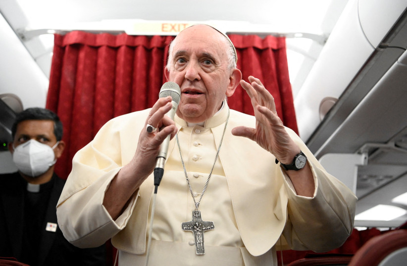  Pope Francis holds a news conference aboard the papal plane on his flight back after visiting Malta (photo credit: VATICAN MEDIA/HANDOUT VIA REUTERS)
