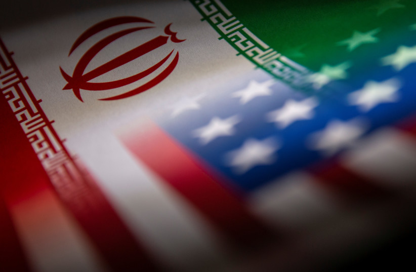  Iran's and US' flags are seen printed on paper in this illustration taken January 27, 2022.  (photo credit: REUTERS/DADO RUVIC/ILLUSTRATION)