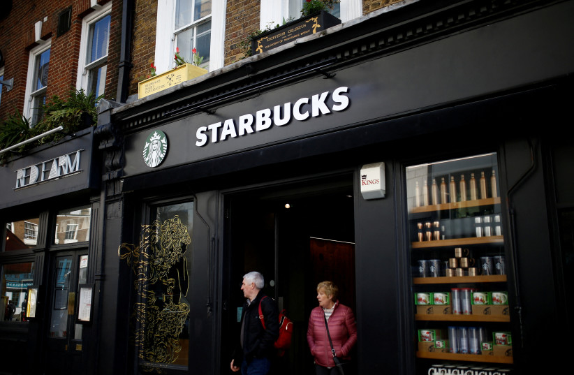  General view of a Starbucks coffee shop in London, Britain, March 6, 2020.  (credit: REUTERS/HENRY NICHOLLS)