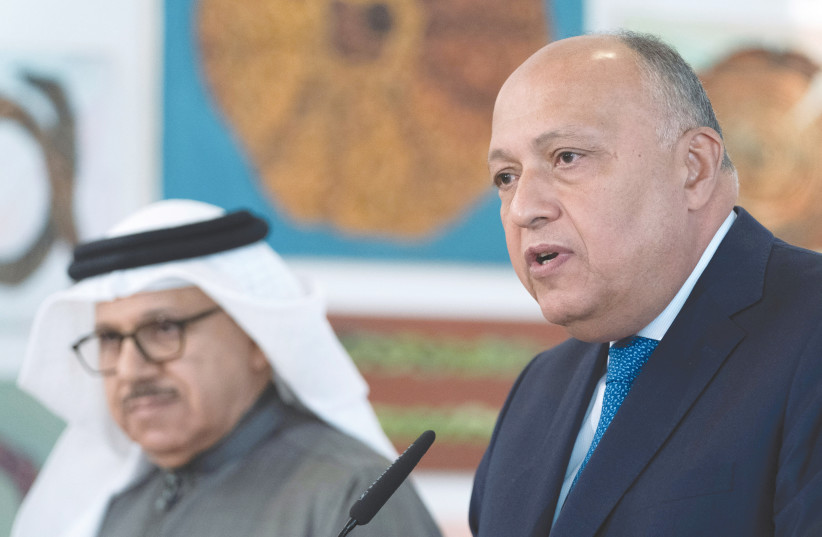  EGYPT’S FOREIGN MINISTER Sameh Shoukry (right) speaks next to Bahrain’s Foreign Minister Abdullatif bin Rashid Al Zayani at the Negev Summit last week. Egypt is willing to draw closer to the ‘warm peace club.’ (photo credit: Jacquelyn Martin/Reuters)