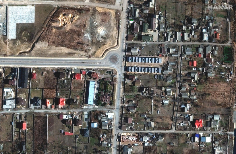  A satellite image shows an overview of Yablonska Street, in Bucha, Ukraine, March 18, 2022. Picture taken March 18, 2022. (photo credit: Satellite image 2022 Maxar Technologies/Handout via REUTERS)