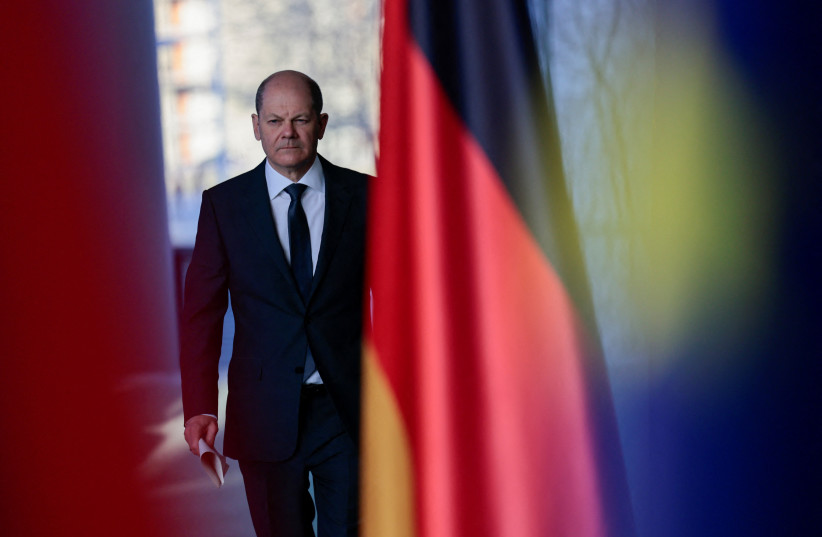  German Chancellor Olaf Scholz arrives to give a press statement about the war crimes discovered the day before in Bucha, Ukraine, at the Chancellery in Berlin, Germany April 3, 2022.  (credit: HANNIBAL HANSCHKE/POOL VIA REUTERS)