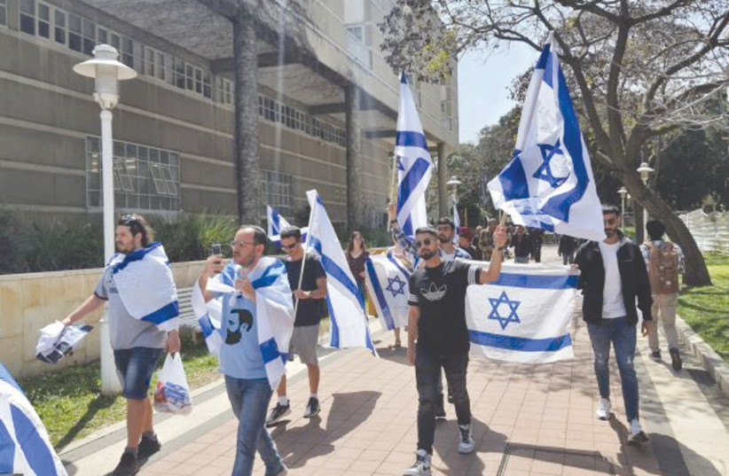  A FLAG MARCH takes place on the campus of Bar-Ilan University in support of displaying the Israeli flag. (photo credit: IM TIRTZU)