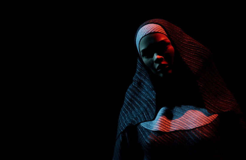  Nun in the dark (illustrative) (photo credit: INGIMAGE)