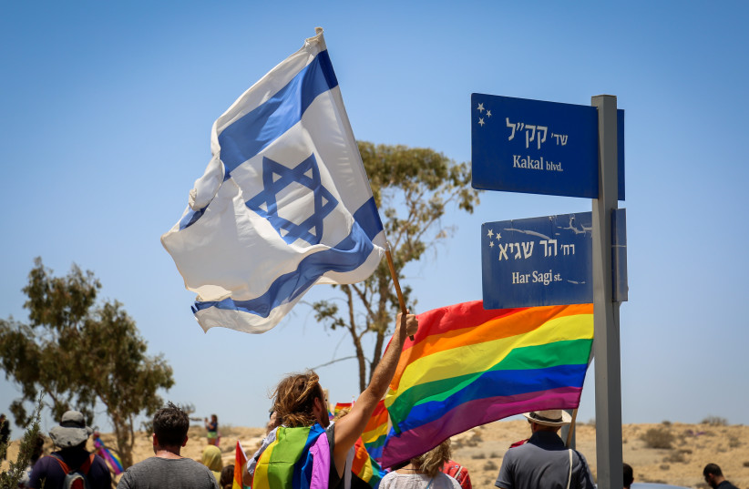  People participate in the first Gay Pride Parade in Mitzpe Ramon, on July 2, 2021.  (photo credit: FLASH90)