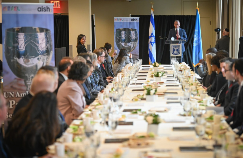  Ambassador Gilad Erdan hosts a mock Passover Seder at the UN headquarters in New York for diplomats. April 6, 2022 (credit: SHAHAR AZRAN)