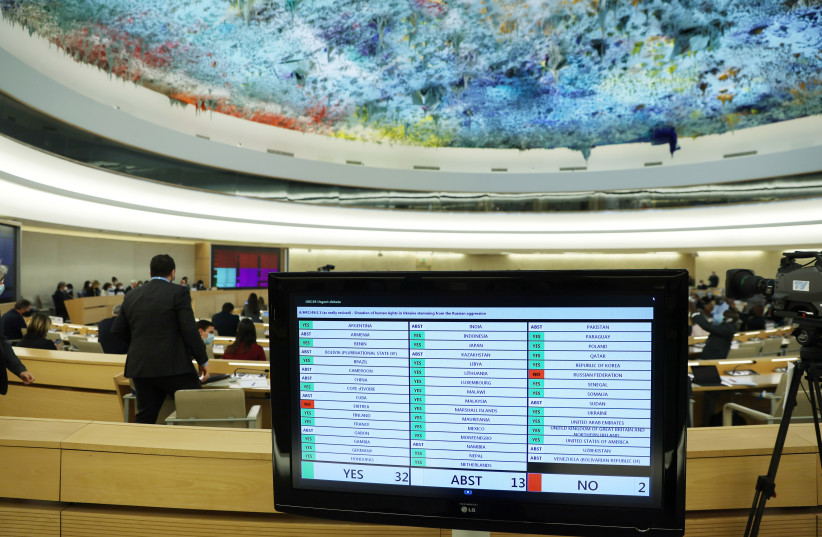  A screen with the result of a vote is pictured during the special session on the situation in Ukraine of the Human Rights Council at the United Nations in Geneva, Switzerland, March 4, 2022. (credit: REUTERS/DENIS BALIBOUSE)