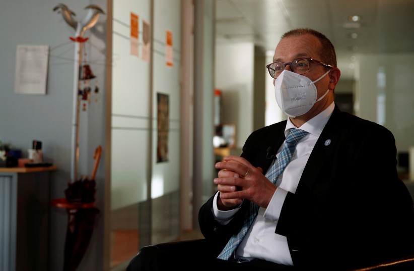 World Health Organization's Regional Director for Europe Hans Kluge gives an interview for Reuters in Brussels, Belgium, December 22, 2021.  (credit: REUTERS/Johanna Geron)
