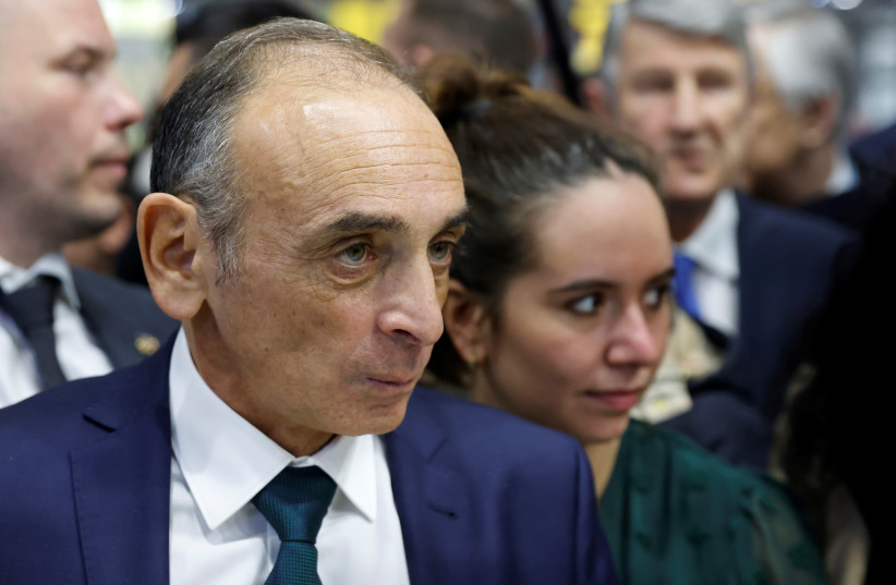  French far-right commentator Eric Zemmour, leader of far-right party ''Reconquete!'' and candidate for the 2022 French presidential election, and his companion and campaign advisor Sarah Knafo visit the 58th International Agriculture Fair (Salon de l'Agriculture) at the Porte de Versailles exhibition (credit: REUTERS/Johanna Geron)