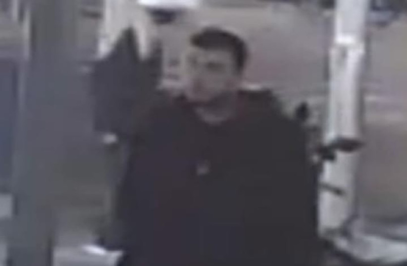 Police need help finding this man, believed to be responsible for the terror attack on Dizengoff Street in Tel Aviv. (credit: POLICE SPOKESPERSON'S UNIT)