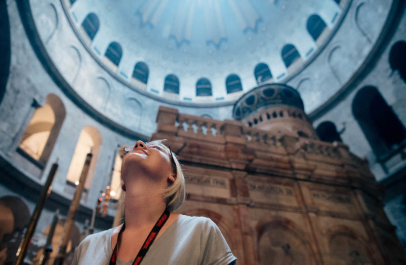  Christian students visit the Church of the Holy Sepulchre in Jerusalem on a trip with Passages  (photo credit: Courtesy / ALL ISRAEL NEWS)