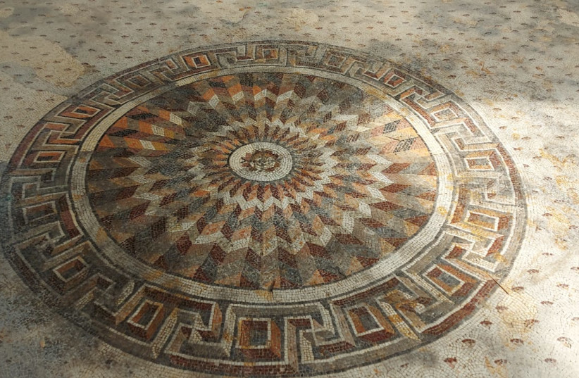 Restoration of a spectacular mosaic floor from a Byzantine-period Christian basilica was recently completed in a residential neighborhood of Nahariya some 30 years after it was uncovered by the Israel Antiquities Authority. The 500-square-meter mosaic decorated with images of daily life. (photo credit: ELI OKNIN)