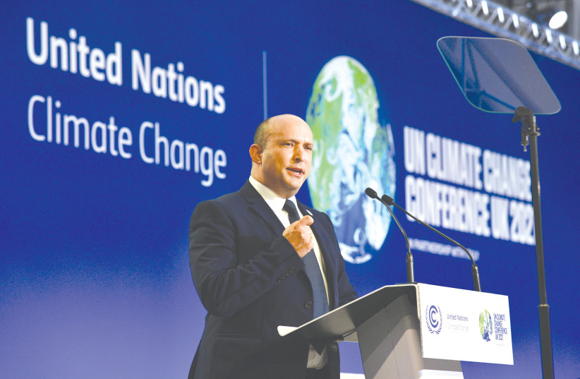  PRIME MINISTER Naftali Bennett speaks at the United Nations Climate Change Conference in Glasgow, in November. (photo credit: HAIM ZACH/GPO)