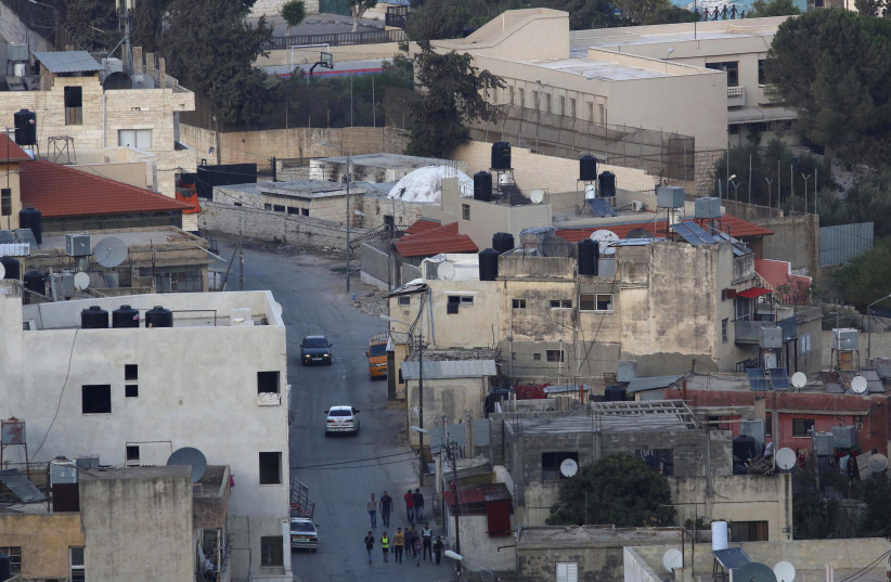 A general view shows Joseph's Tomb (white dome) in the West Bank city of Nablus, October 16, 2015. (photo credit: REUTERS/AHMAD TALAT)