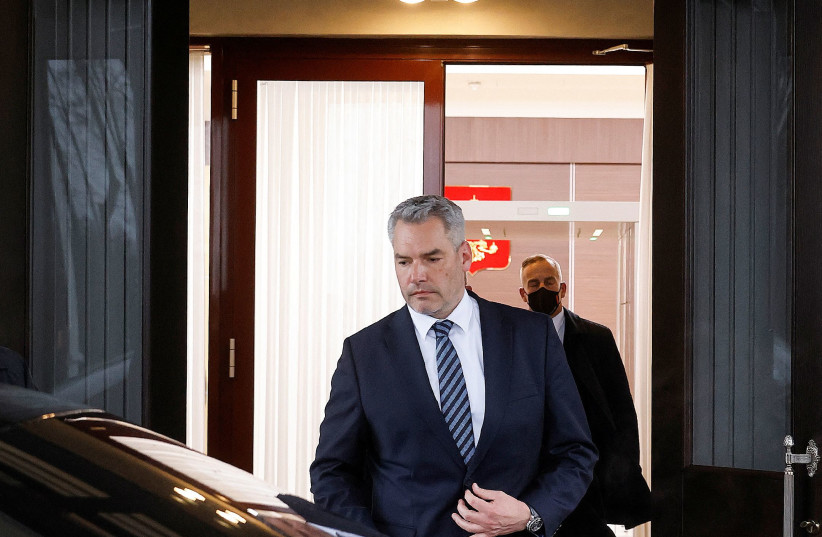  Austrian Chancellor Karl Nehammer leaves after a meeting with Russian President Vladimir Putin, as Russia's attack on Ukraine continues, near Moscow, Russia April 11, 2022. (photo credit: Bundeskanzleramt/Dragan Tatic/Handout via REUTERS )