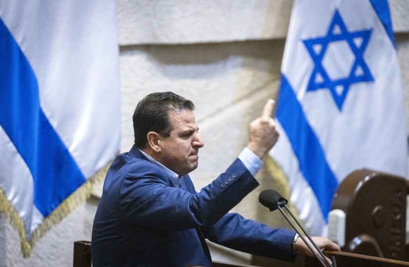  Joint list leader MK Ayman Odeh speeks during a discussion on the ''Kafr Kassem massacre,'' during a plenum session in the Knesset, in Jerusalem, on October 27, 2021.  (credit: OLIVIER FITOUSSI/FLASH90)