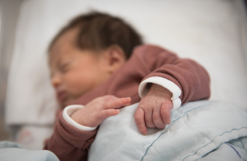  A newborn baby at the Sha'arei Tzedek Hospital in Jerusalem.  (credit: HADAS PARUSH/FLASH90)