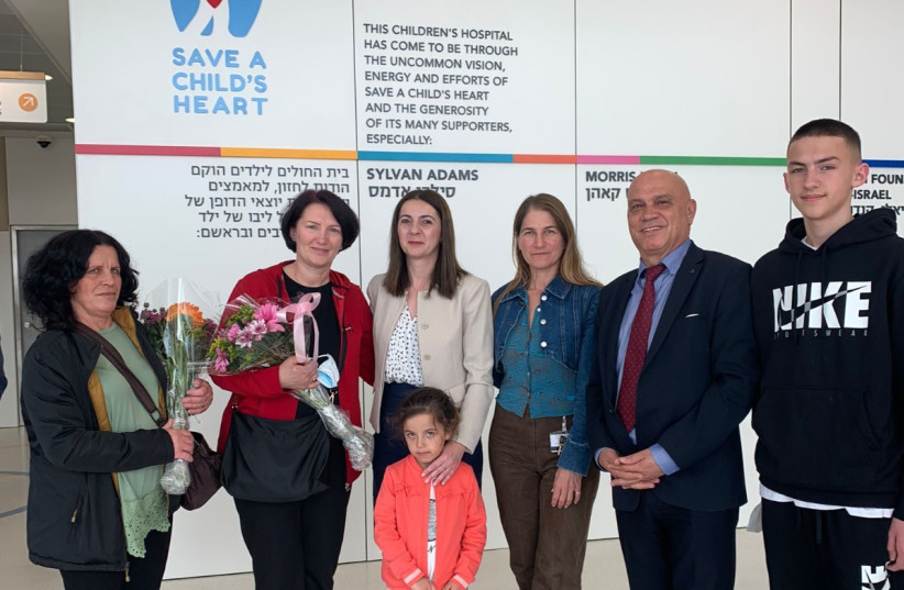  Regional Cooperation Minister Esawi Frej meeting Anisa and Florim, two children who were brought from Kosovo to Israel by Save a Child's Heart to undergo life-saving cardiac care at Wolfson Hospital. (credit: SAVE A CHILD'S HEART)