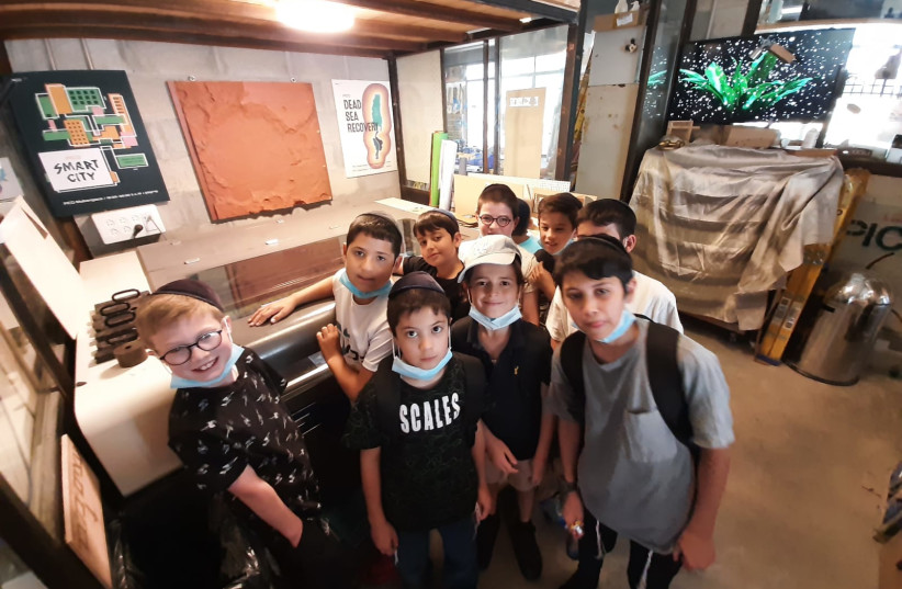 Students create a solution for lighting Shabbat candles in space at the Dibrot Moshe school in Jerusalem. (photo credit: BABA-Da)