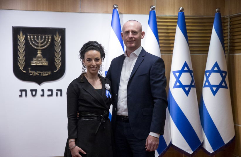  Knesset member of Yamina party Idit Silman and her husband, Shmulik, arrive to the parliament for attending the swearing-in ceremony of the 24th Knesset in Jerusalem, April 6, 2021 (credit: OLIVIER FITOUSSI/FLASH90)
