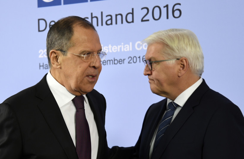  German Foreign Minister Frank-Walter Steinmeier (R) welcomes his Russian counterpart Sergey Lavrov at the 23rd OSCE Ministerial Council organized by Germany's OSCE Chairmanship in Hamburg, Germany December 8, 2016.  (credit: REUTERS/FABIAN BIMMER)