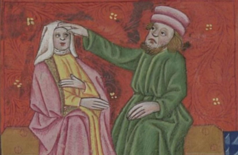  Closeup of the man and his “bitter wife” in the “Tegernsee Haggadah“ (credit: NATIONAL LIBRARY OF ISRAEL DIGITAL COLLECTION)