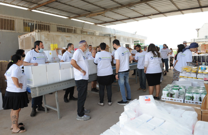  IFCJ contributed in almost 50% increase in food baskets for Passover. (credit: IFCJ, ISRAEL YOSEF)