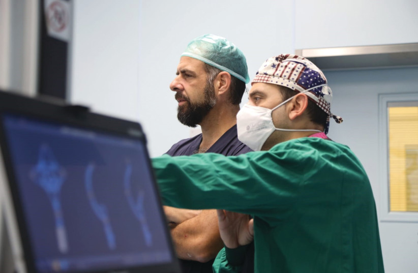  PROF. MICHAEL DREXLER, (L) Orthopedics Department head, is one of Israel’s leading robotic joint replacement surgeons. (photo credit: Assuta Ashdod)