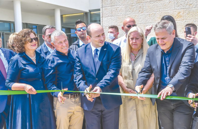  PRIME MINISTER Naftali Bennett and Health Minister Nitzan Horowitz (right) inaugurate a new rehabilitation center in Aleh Negev, on Tuesday. (photo credit: Haim Horenstein/Flash90)