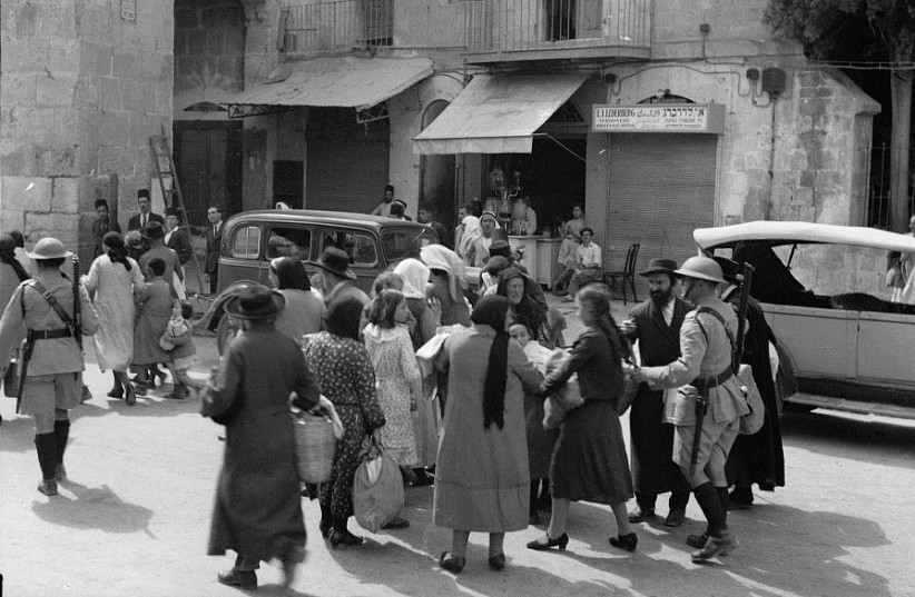  Jews evacuate the Old City of Jerusalem after Arab riots in 1936. (credit: Wikimedia Commons)