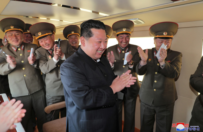  North Korean leader Kim Jong Un reacts during the test-firing of a new-type tactical guided weapon according to state media, North Korea, in this undated photo released on April 16, 2022 by North Korea's Korean Central News Agency (KCNA). (photo credit: KCNA VIA REUTERS)
