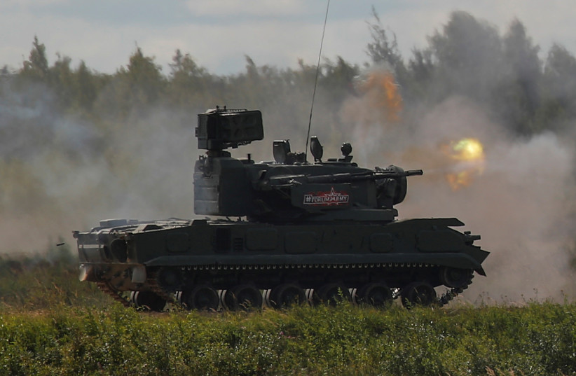  A Russian 2K22 Tunguska anti-aircraft vehicle fires during a demonstration at the annual international military-technical forum ''ARMY'' in Alabino, outside Moscow, Russia August 23, 2018. (credit: MAXIM SHEMETOV/REUTERS)