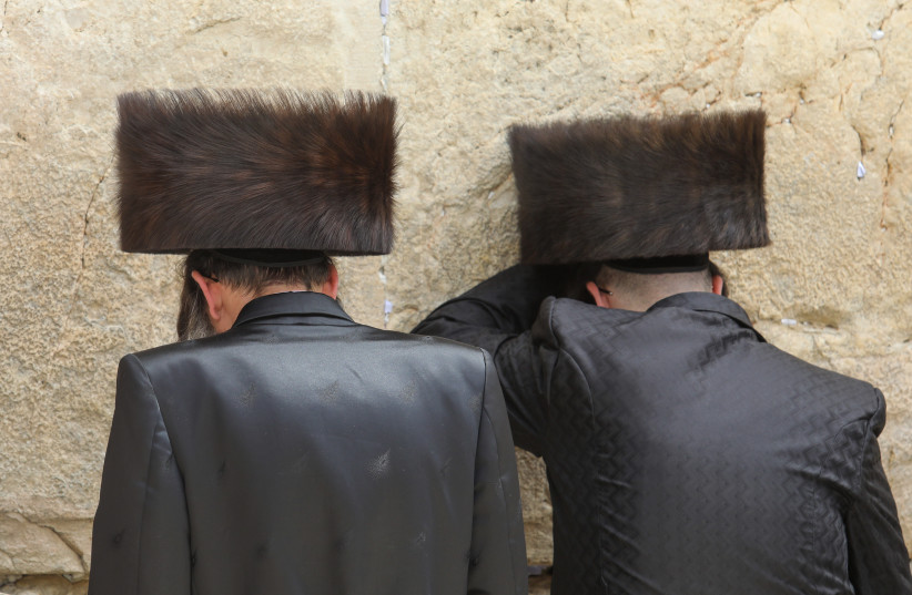  Ultra-Orthodox Jews pray at the Western Wall in Jerusalem on April 17, 2022 (photo credit: MARC ISRAEL SELLEM/THE JERUSALEM POST)