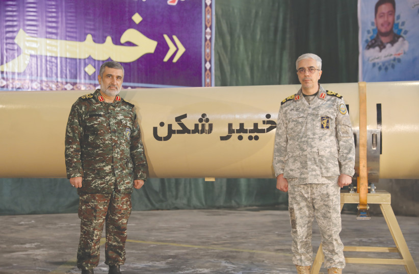  CHIEF OF STAFF of Iran’s Armed Forces Maj.-Gen. Mohammad Bagheri (right) and IRGC Aerospace Force Commander Amir Ali Hajizadeh at the unveiling of the Kheibarshekan missile at an undisclosed location in Iran, in February (credit: REUTERS)