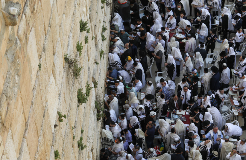  Priestly blessing at the Western Wall in Jerusalem during Passover, April 18, 2022 (photo credit: MARC ISRAEL SELLEM)
